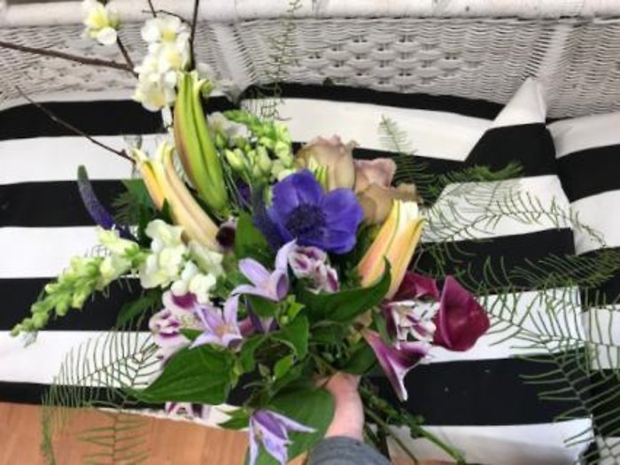 merlot and purples wrapped bouquet